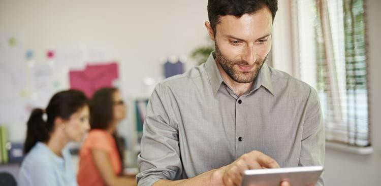 person on tablet